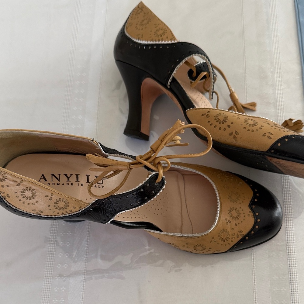 Anyi Lu Black and Tan Perforated Leather Lace-Up Heels